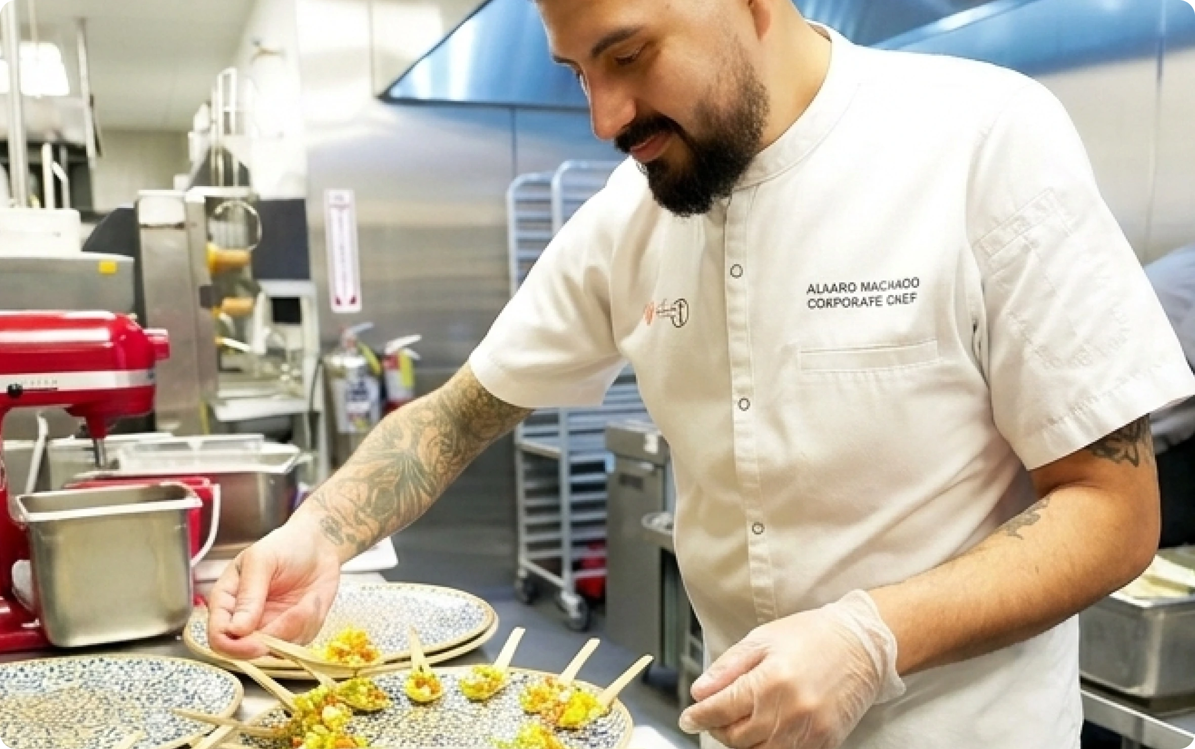 A Novecento chef preparing plates for an event